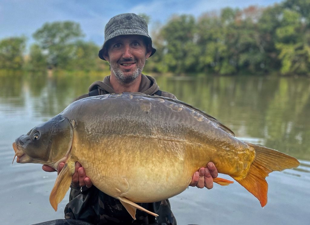 Alan with a big French mirror carp